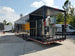 8.5' x 30' Black on Black Porch Style Concession Food Trailer With Appliances