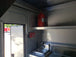 Black Out 8.5' x 24' Porch Style Concession Food Trailer