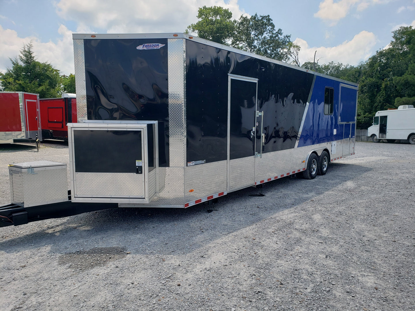 8.5' x 30' Black and Cobalt Blue Porch Style Concession Trailer