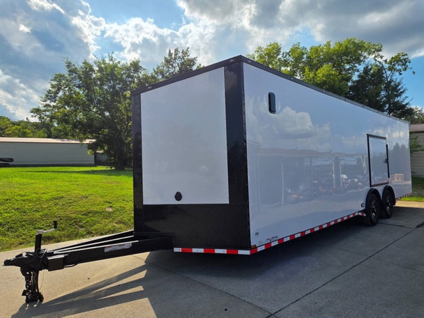 8.5x28 Enclosed Trailer Fully Loaded V Nose 30 Amp Elec. (2) 7,000LB Axle 14K GVWRv Front Left