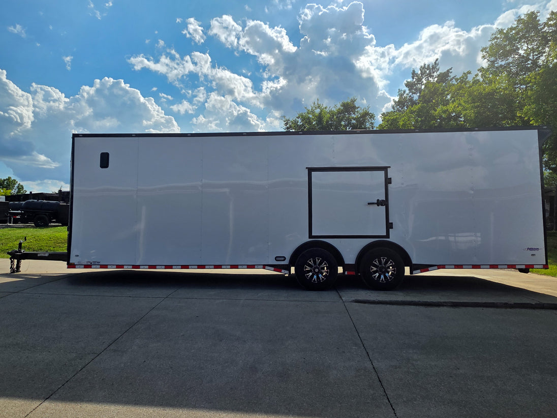 8.5x28 Enclosed Trailer Fully Loaded V Nose 30 Amp Elec. (2) 7,000LB Axle 14K GVWR Left