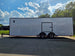 8.5x28 Enclosed Trailer Fully Loaded V Nose 30 Amp Elec. (2) 7,000LB Axle 14K GVWR Left