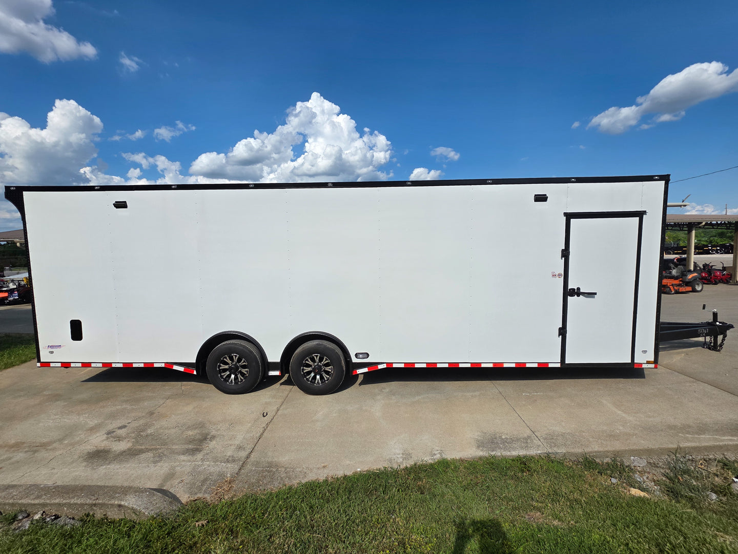 8.5x28 Enclosed Trailer Fully Loaded V Nose 30 Amp Elec. (2) 7,000LB Axle 14K GVWR Right Side