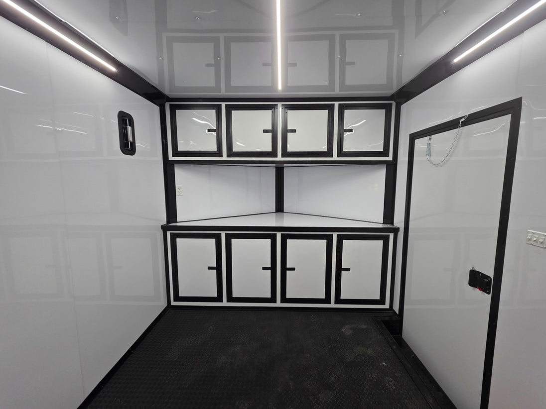 8.5x28 Enclosed Trailer Fully Loaded V Nose 30 Amp Elec. (2) 7,000LB Axle 14K GVWR Front Cabinets 