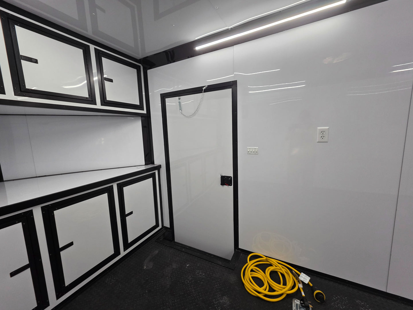 8.5x28 Enclosed Trailer Fully Loaded V Nose 30 Amp Elec. (2) 7,000LB Axle 14K GVWR Passenger Side Door Inside