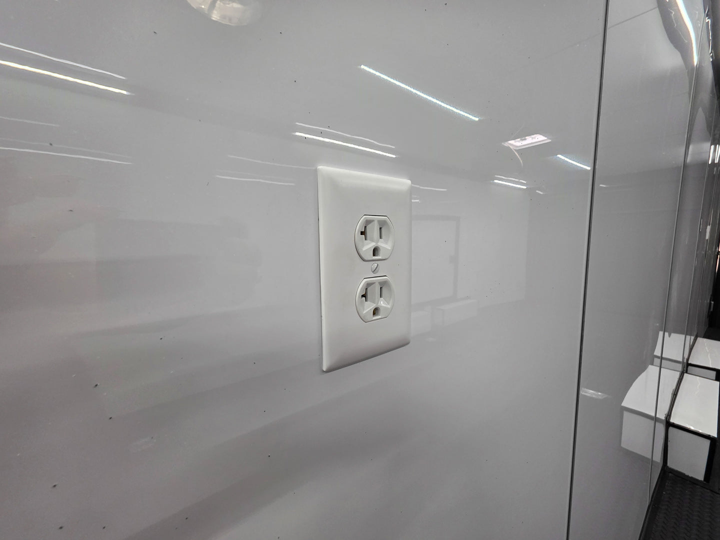 8.5x28 Enclosed Trailer Fully Loaded V Nose 30 Amp Elec. (2) 7,000LB Axle 14K GVWR Plugs