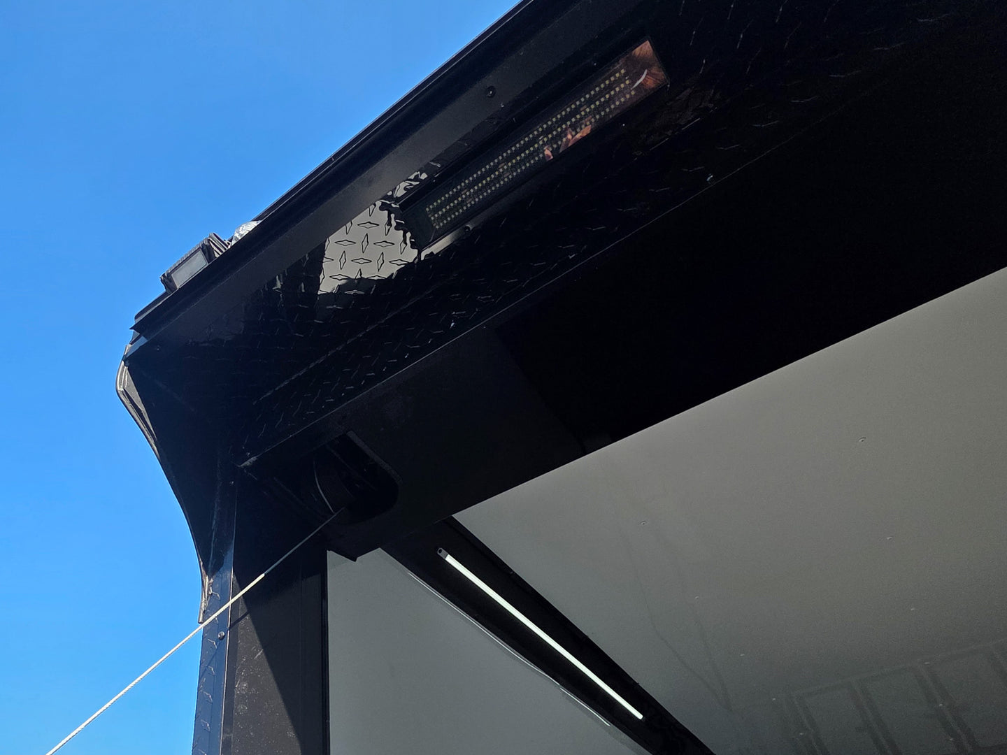 8.5x28 Enclosed Trailer Fully Loaded V Nose 30 Amp Elec. (2) 7,000LB Axle 14K GVWR Rear Ramp Lights