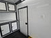 8.5x28 Enclosed Trailer Fully Loaded V Nose 30 Amp Elec. (2) 7,000LB Axle 14K GVWR Inside Passenger Door 