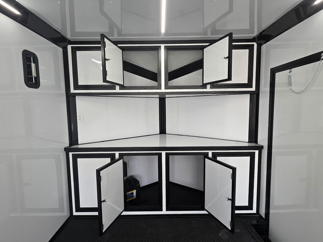 8.5x28 Enclosed Trailer Fully Loaded V Nose 30 Amp Elec. (2) 7,000LB Axle 14K GVWR Cabinets Open