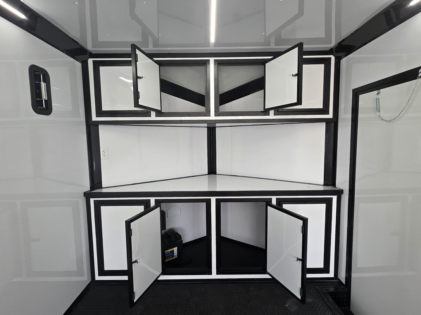 8.5x28 Enclosed Trailer Fully Loaded V Nose 30 Amp Elec. (2) 7,000LB Axle 14K GVWR Cabinets Open