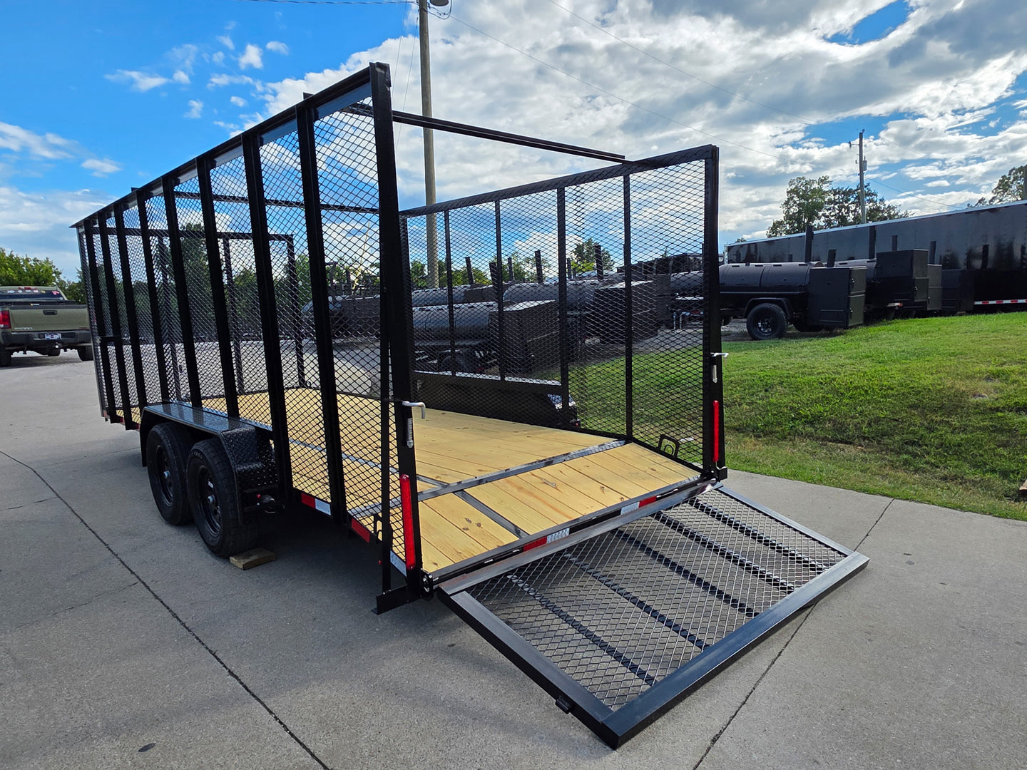 7x18 Dovetail Debris Utility Trailer w/ Side Gate 6 Foot Mesh sides (2) 3,500lb Axles 7K GVWR Left Rear Gate Down