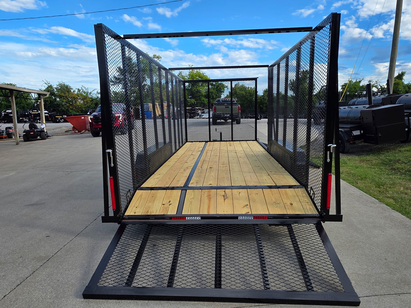 7x18 Dovetail Debris Utility Trailer w/ Side Gate 6 Foot Mesh sides (2) 3,500lb Axles 7K GVWR Rear Gate Down