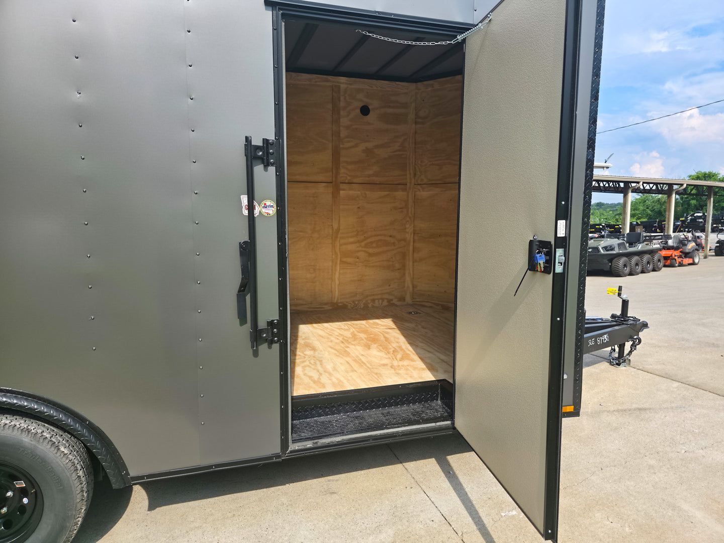 8.5 x 18 Charcoal/Black Enclosed Trailer with Blackout and (2) Heavy-Duty 5,200lb Axles Side Door Open
