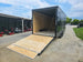 8.5 x 18 Charcoal/Black Enclosed Trailer with Blackout and (2) Heavy-Duty 5,200lb Axles Right Rear Ramp Open