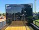 8.5x20 Enclosed Hybrid Black with Black Trim (2) 5200LB Axles Jack Rear Door
