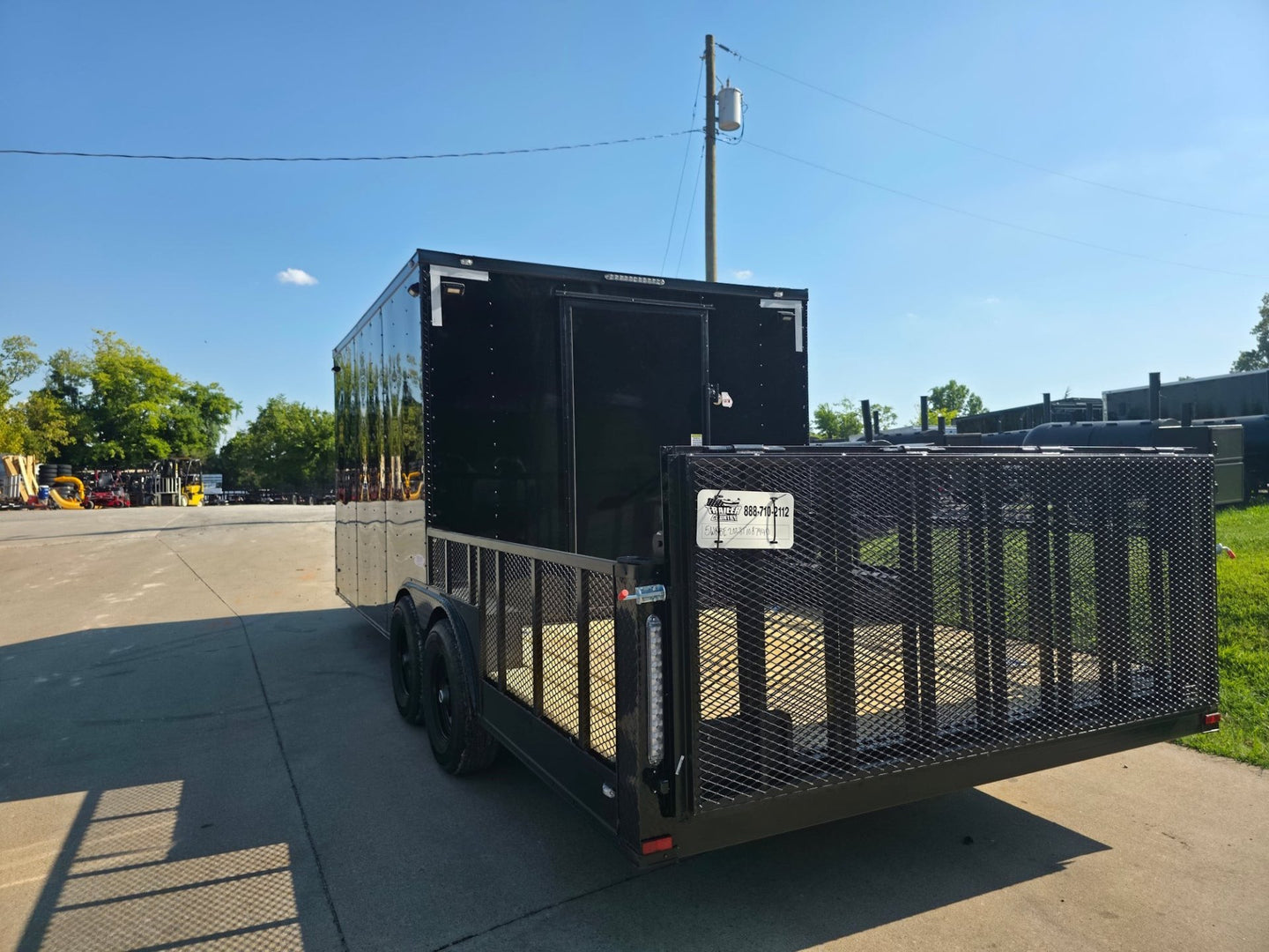 8.5x20 Enclosed Hybrid Black with Black Trim (2) 5200LB Axles Left Rear