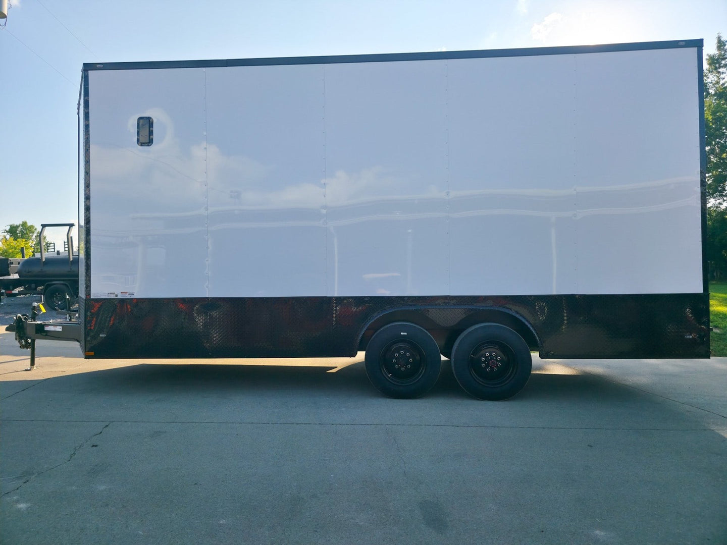 8.5x20 White V-Nose Enclosed Trailer with Blackout Pkg 9' Interior (2) 10,000LB Axles Left Side