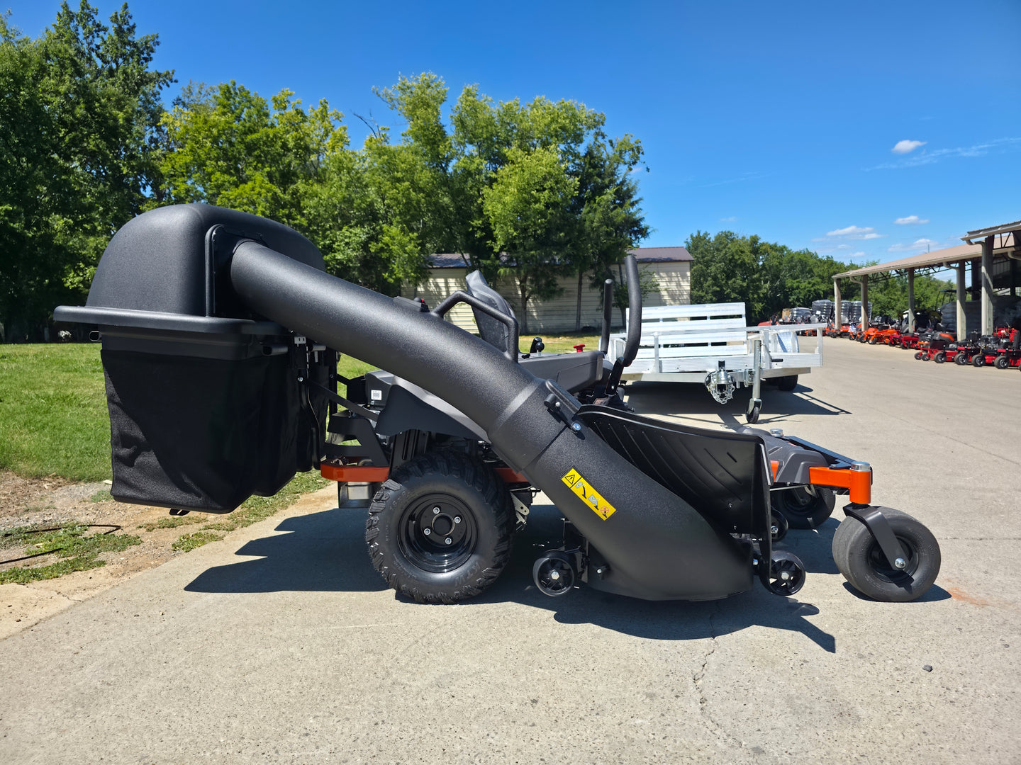 Husqvarna Z254F Special Edition Zero Turn Mower 23HP KAW with 591111401 Triple Bagger Left Side