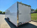 8.5x28 Flat Nose White Enclosed Trailer Roll Out Awning with AC Unit (2) 5,200LB Axles Left Rear