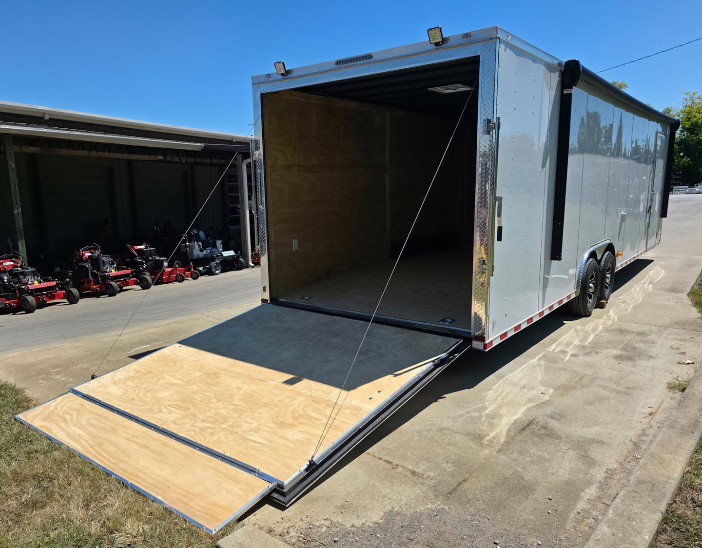 8.5x28 Flat Nose White Enclosed Trailer Roll Out Awning with AC Unit (2) 5,200LB Axles Right Rear Ramp Down