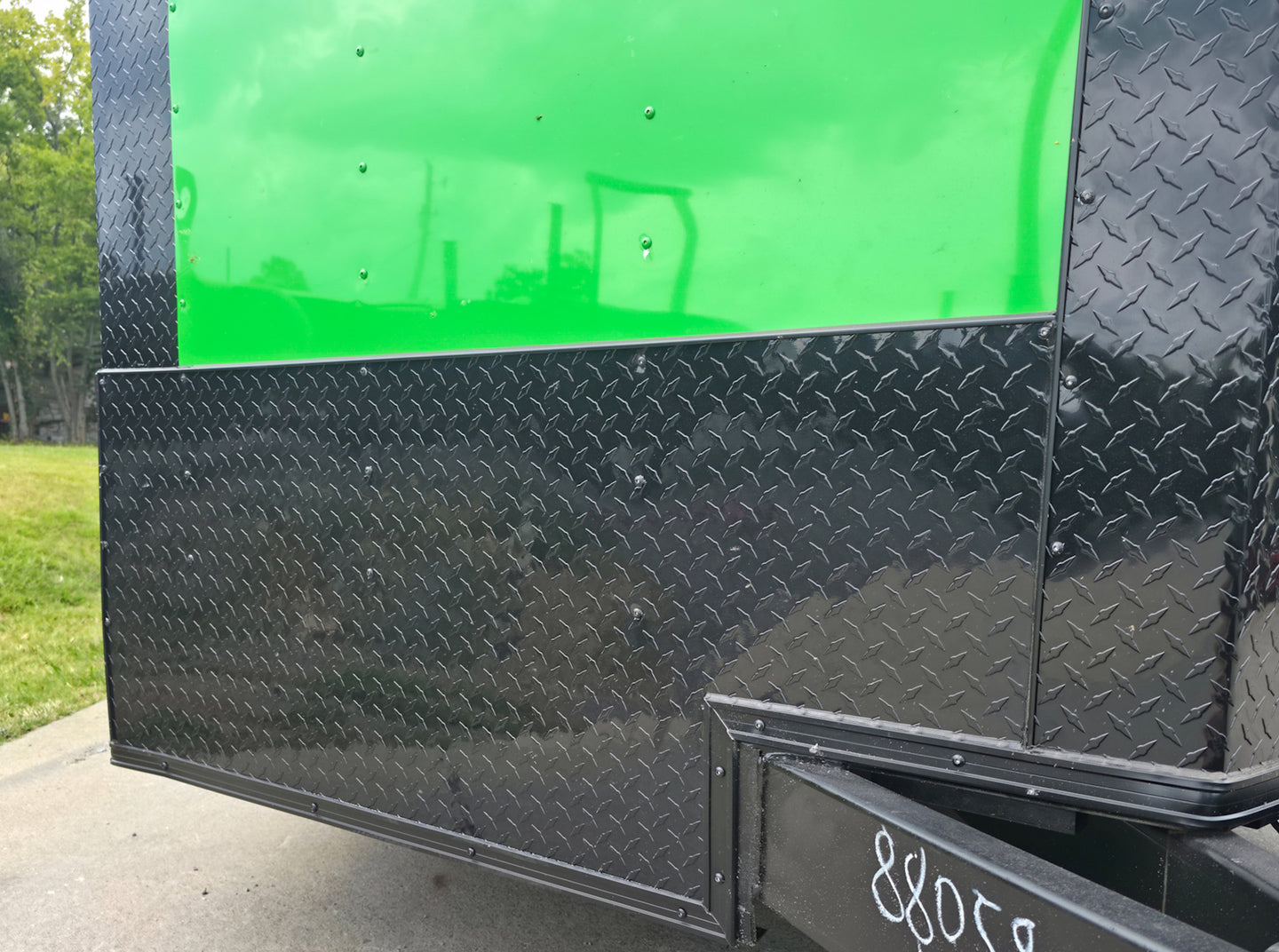 8.5x24 V Nose Neon Green Enclosed Trailer (2) 5200 LB Axles With Brakes 7 Ft Interior Height With Black Out Package ATP Stoneguard