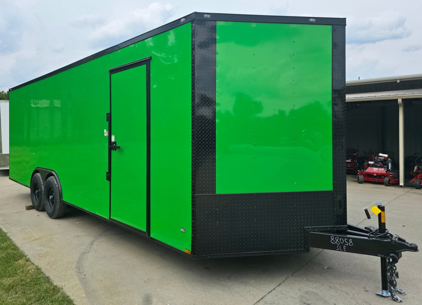 8.5x24 V Nose Neon Green Enclosed Trailer (2) 5200 LB Axles With Brakes 7 Ft Interior Height With Black Out Package Front Right 
