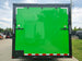 8.5x24 V Nose Neon Green Enclosed Trailer (2) 5200 LB Axles With Brakes 7 Ft Interior Height With Black Out Package Rear