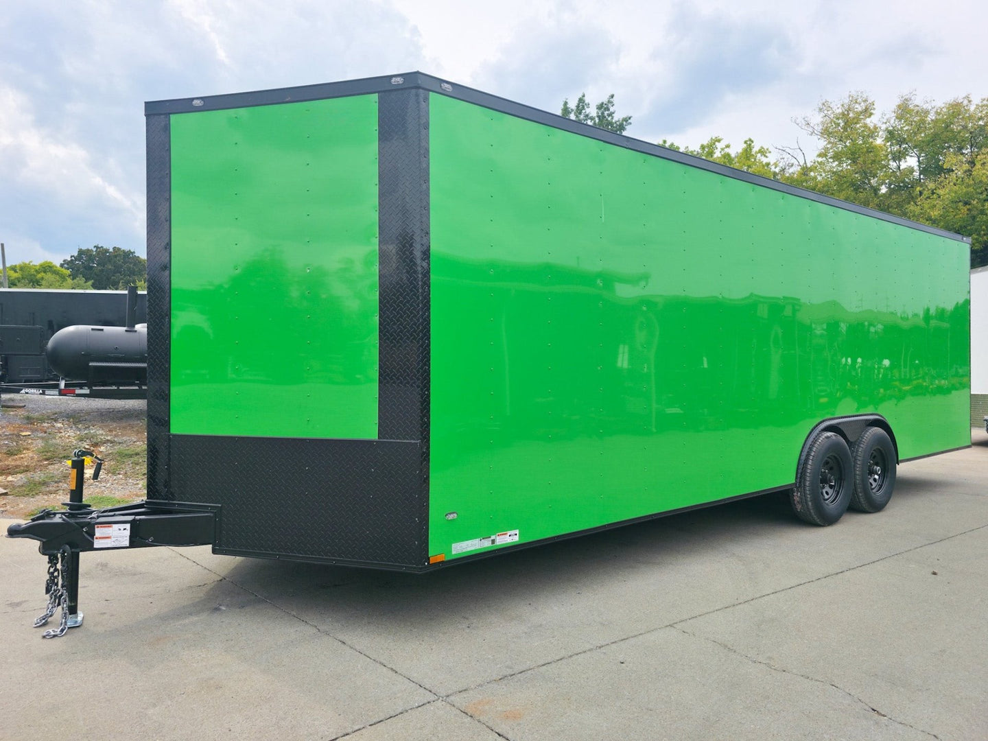 8.5x24 V Nose Neon Green Enclosed Trailer (2) 5200 LB Axles With Brakes 7 Ft Interior Height With Black Out Package Front Left