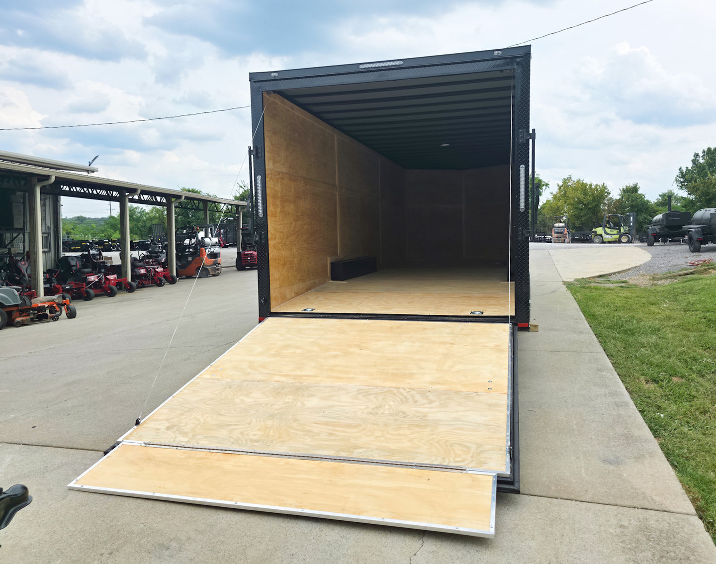 8.5x24 V Nose Neon Green Enclosed Trailer (2) 5200 LB Axles With Brakes 7 Ft Interior Height With Black Out Package Rear Ramp Down