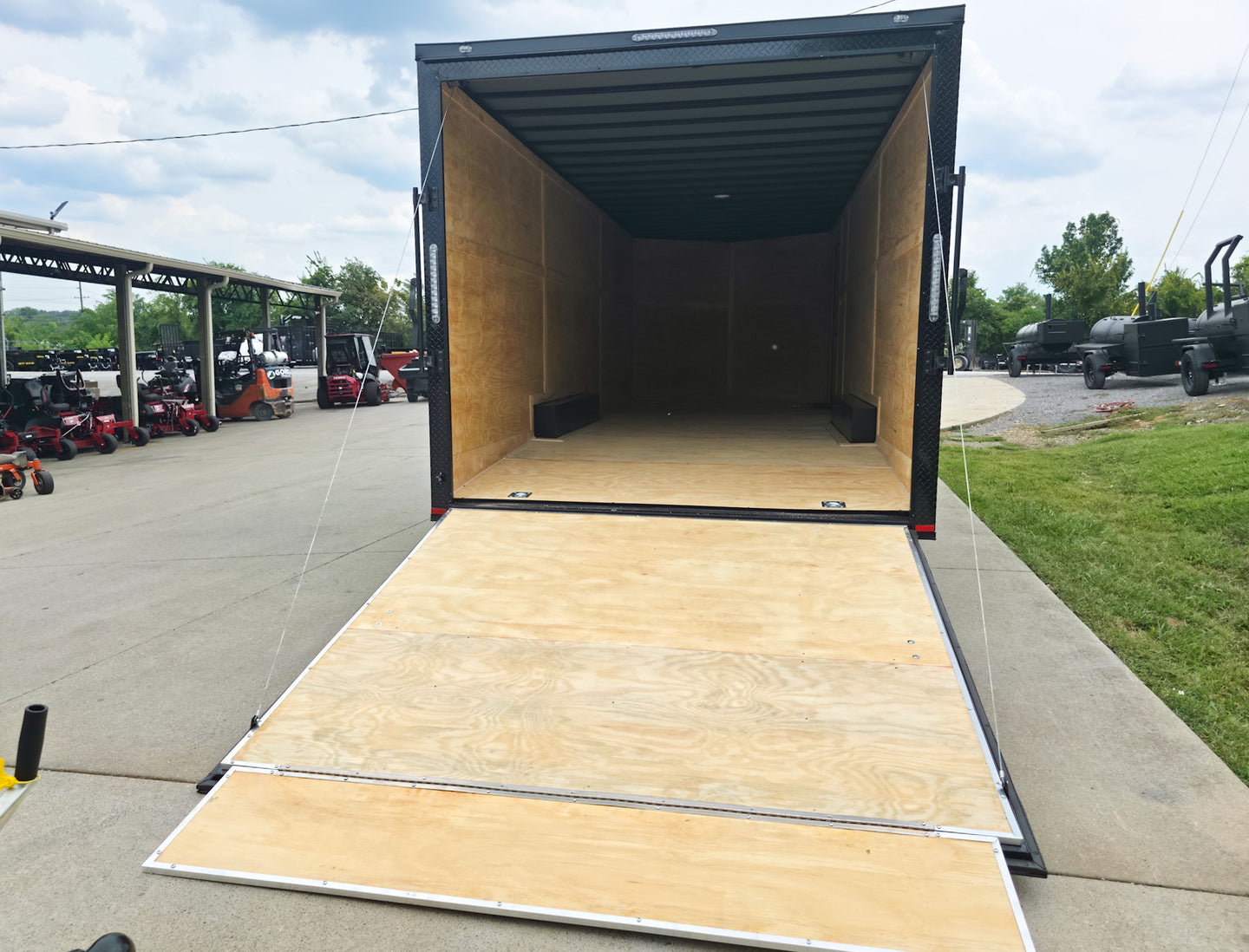 8.5x24 V Nose Neon Green Enclosed Trailer (2) 5200 LB Axles With Brakes 7 Ft Interior Height With Black Out Package Rear Ramp Down