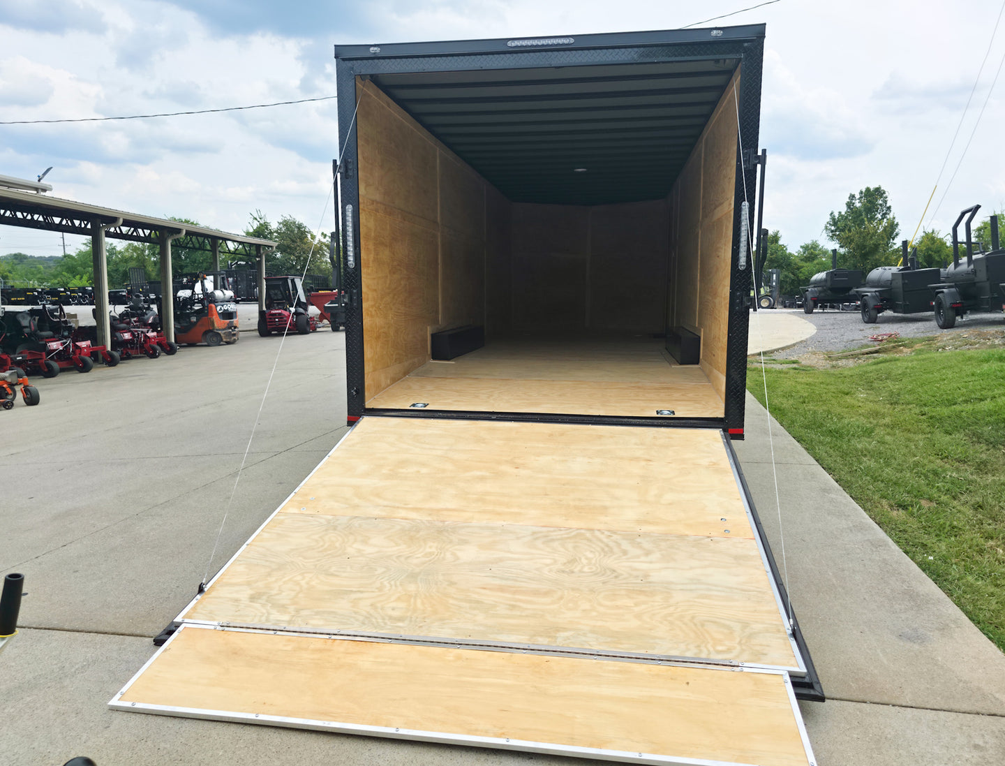 8.5x24 V Nose Neon Green Enclosed Trailer (2) 5200 LB Axles With Brakes 7 Ft Interior Height With Black Out Package Rear Ramp Down