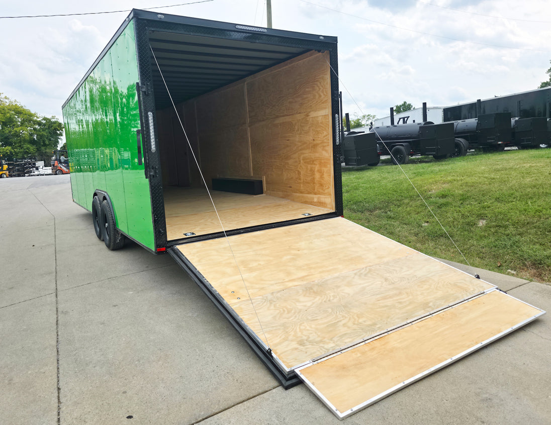 8.5x24 V Nose Neon Green Enclosed Trailer (2) 5200 LB Axles With Brakes 7 Ft Interior Height With Black Out Package Left Rear Ramp Down