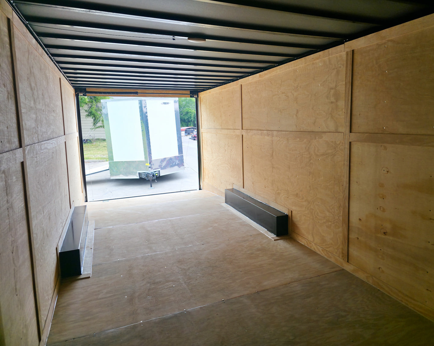 8.5x24 V Nose Neon Green Enclosed Trailer (2) 5200 LB Axles With Brakes 7 Ft Interior Height With Black Out Package Inside Left Side