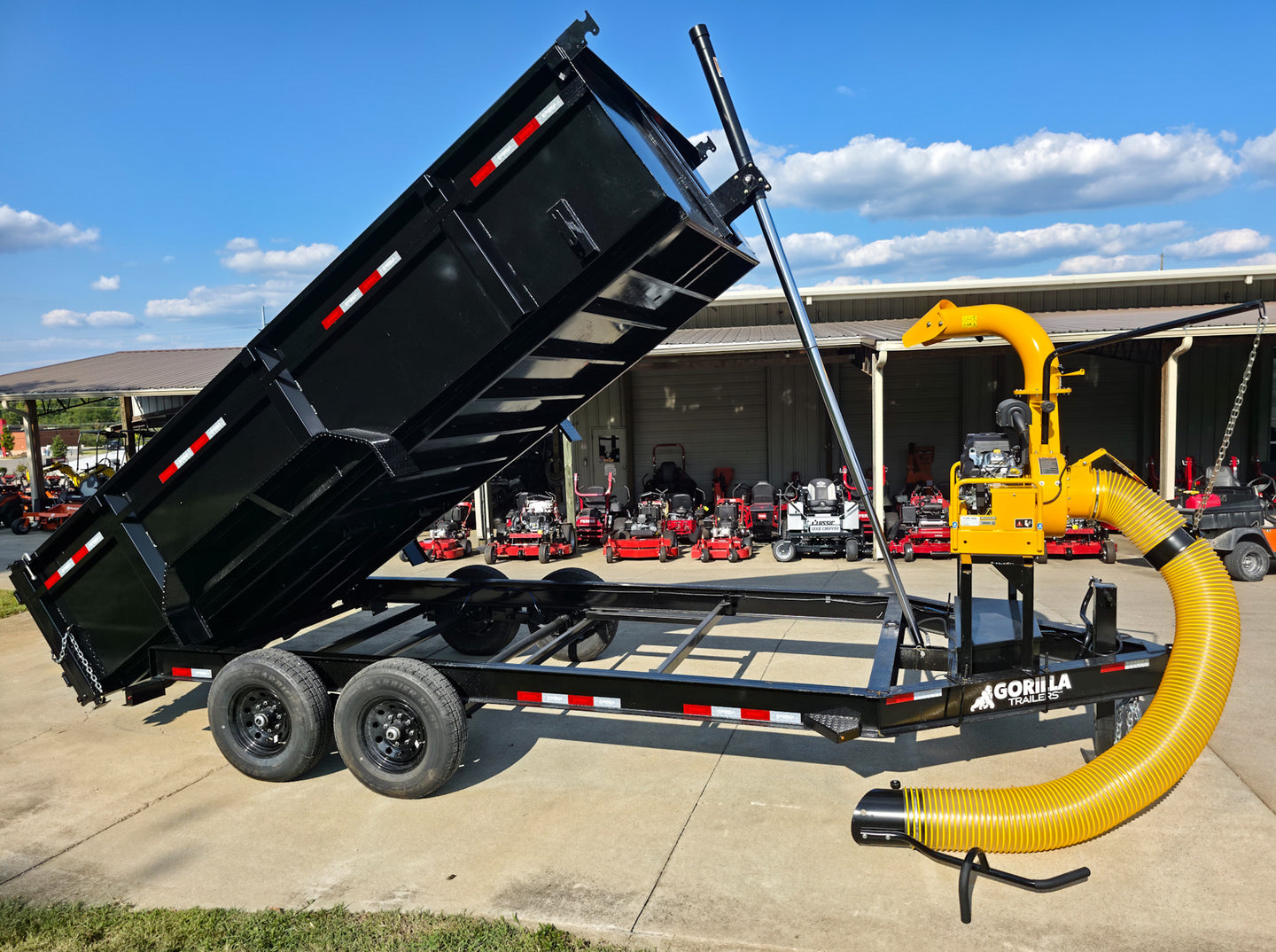 7x16x3 Gorilla Telescopic Dump Trailer 14k GVWR with Turf One Debri Loader 21HP V-Twin Right Side