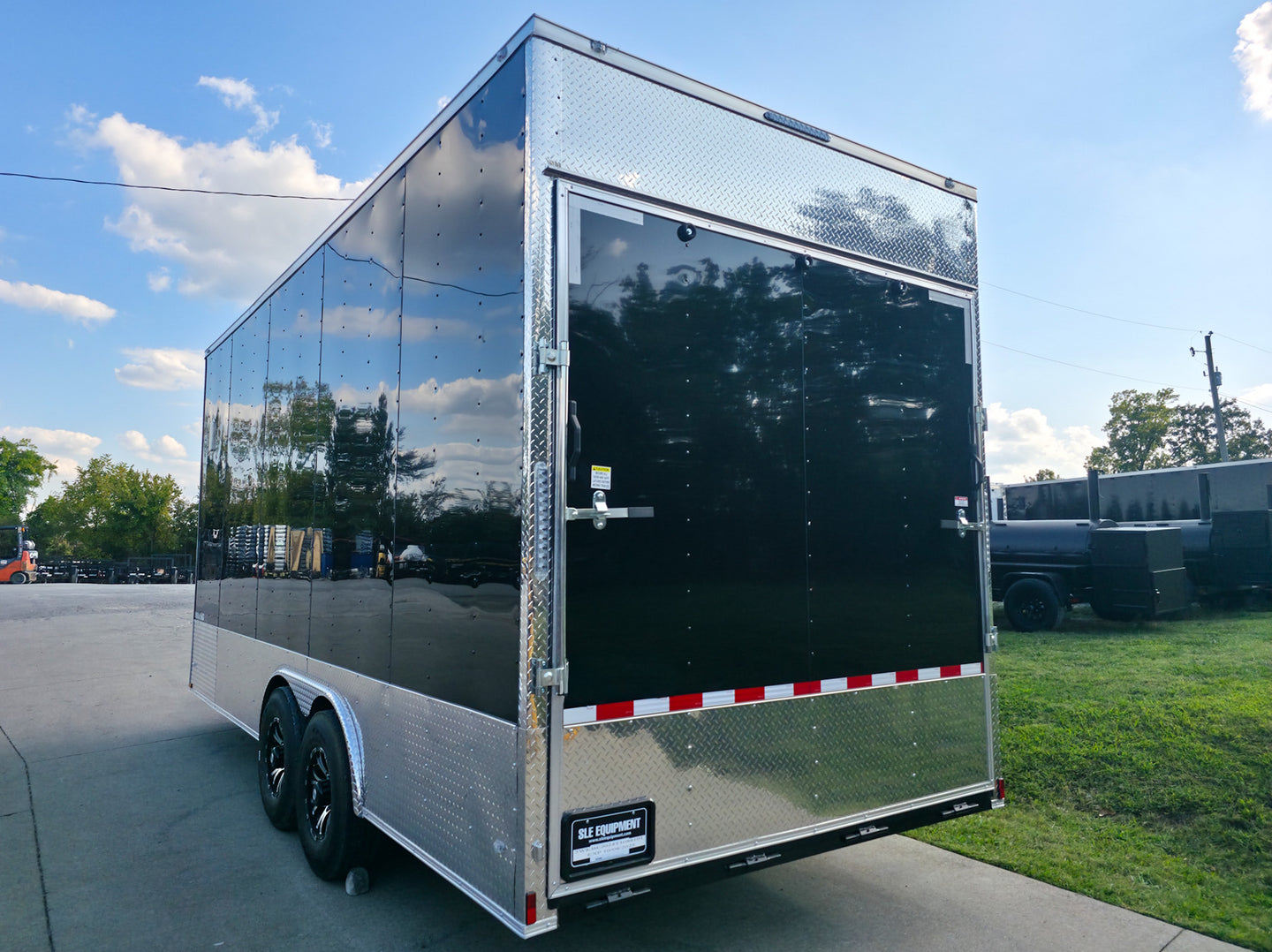8.5x20 Enclosed Flat Nose with 9' Interior Height (2) 7,000LB Axles Left Rear