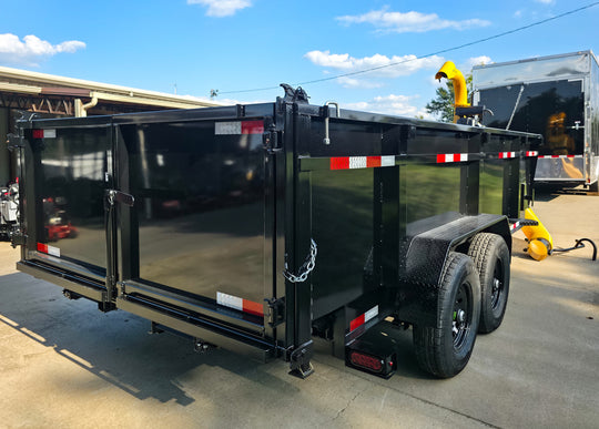 7x16x3 Gorilla Telescopic Dump Trailer 14k GVWR with Turf One Debri Loader 21HP V-Twin Right Rear