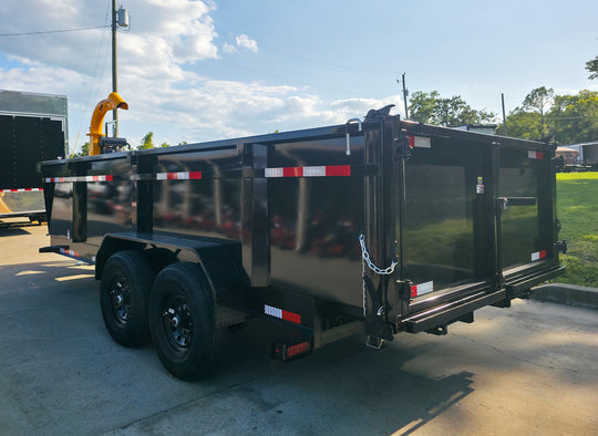 7x16x3 Gorilla Telescopic Dump Trailer 14k GVWR with Turf One Debri Loader 21HP V-Twin Left Rear
