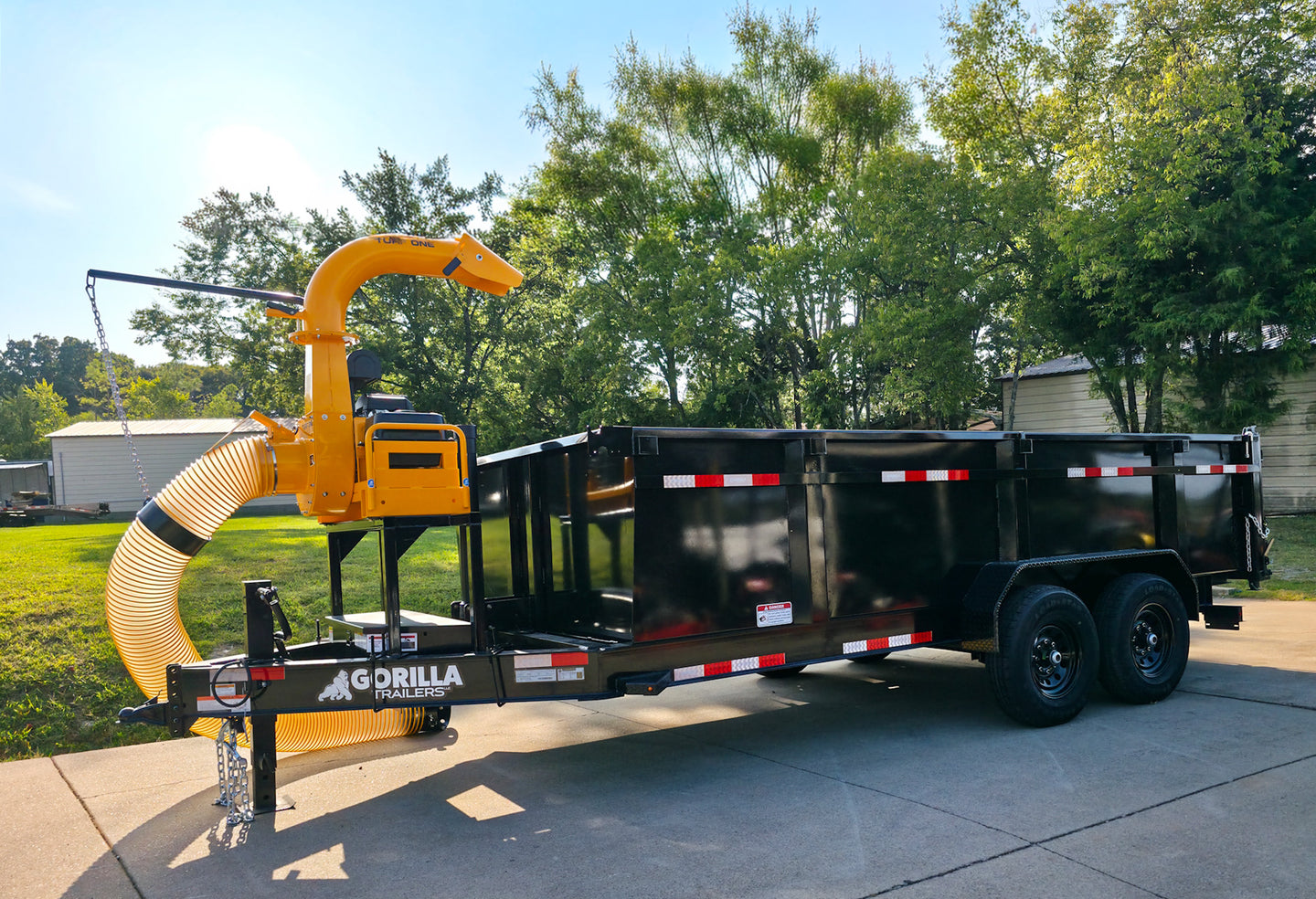 7x16x3 Gorilla Telescopic Dump Trailer 14k GVWR with Turf One Debri Loader 21HP V-Twin Front Right Side