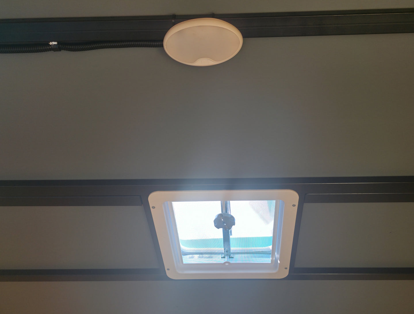 7x24 Black Hybrid Enclosed Trailer Aluminum Trim (2) 5200lb Axles Vent and 12 Volt Light