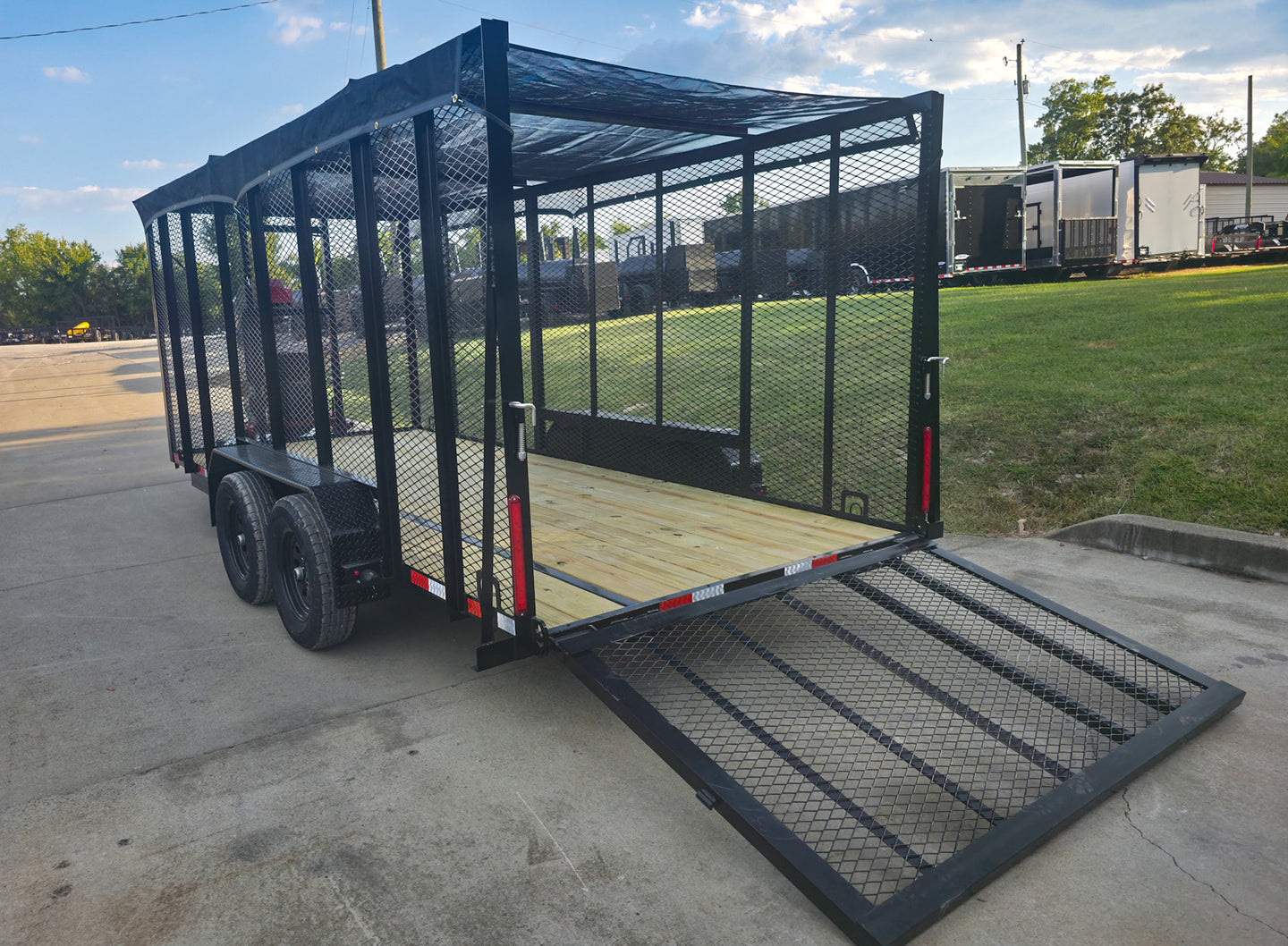 6.4x16 Debris Leaf Junk Trash Removal Trailer with 18HP Debris Loader for Leaf Clean Up Left Rear Gate Open
