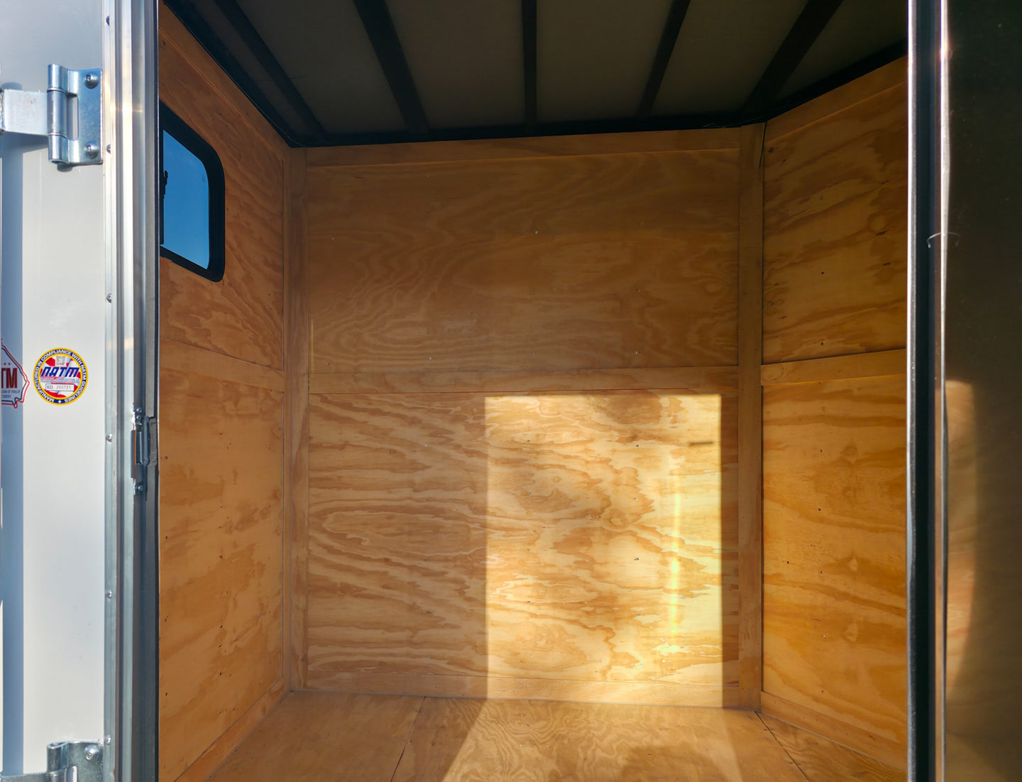 7x18 White Hybrid V Nose Trailer with 1' Mesh Siding (2) 5,200lb Axles Interior From Door