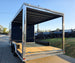 8.5x18 Indigo Enclosed Trailer Hybrid V-Nose with Roof (2)5,200LB Axles Left Rear Side 
