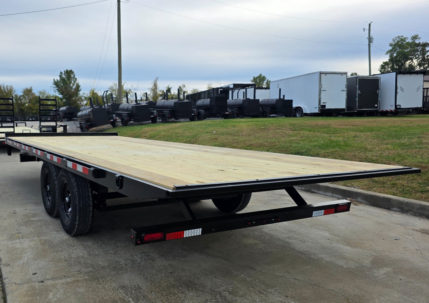8.5x22 Deckover Tilt Trailer (2) 7,000K Axles Left Rear Side
