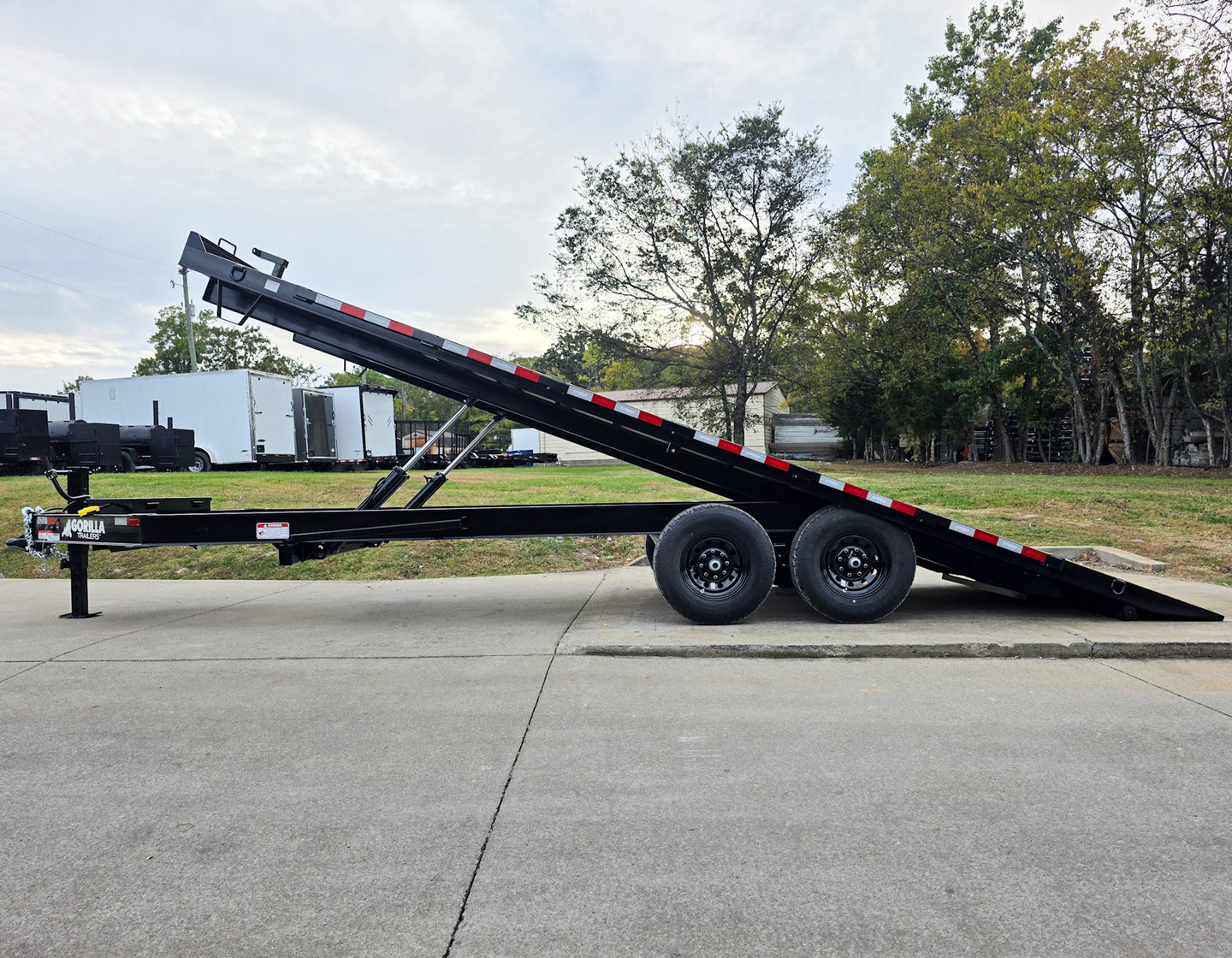 8.5x22 Deckover Tilt Trailer (2) 7,000K Axles Left Side Tilt Lifted 
