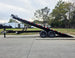 8.5x22 Deckover Tilt Trailer (2) 7,000K Axles Left Side Tilt Lifted 
