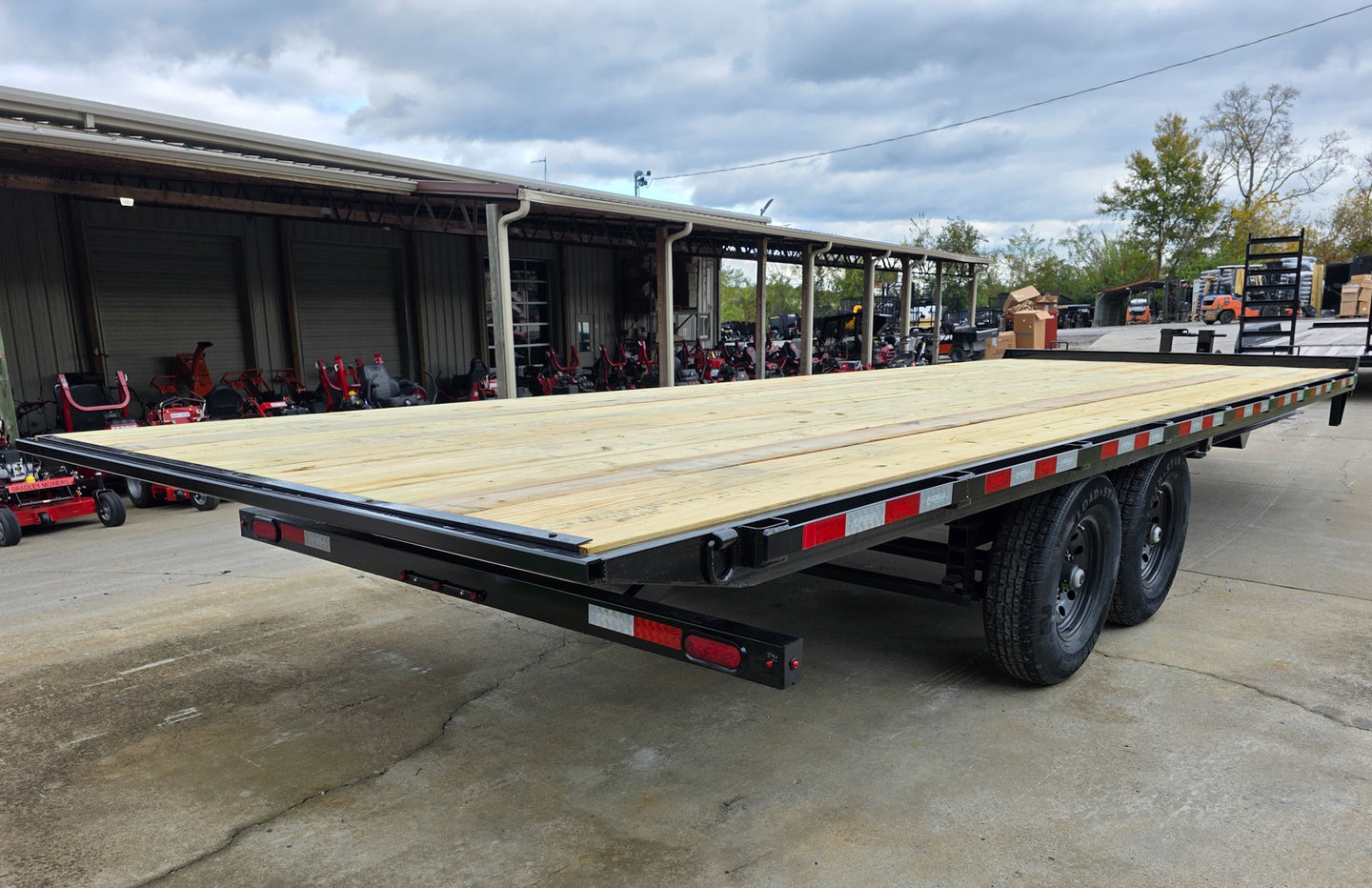 8.5x24 Deckover Tilt Trailer (2) 7,000K Axles Right Rear Tilt Down