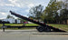 8.5x24 Deckover Tilt Trailer (2) 7,000K Axles Left Side Tilt Lifted 