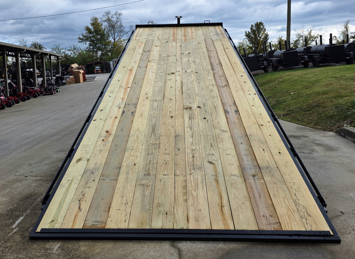 8.5x24 Deckover Tilt Trailer (2) 7,000K Axles Rear Tilt Lifted