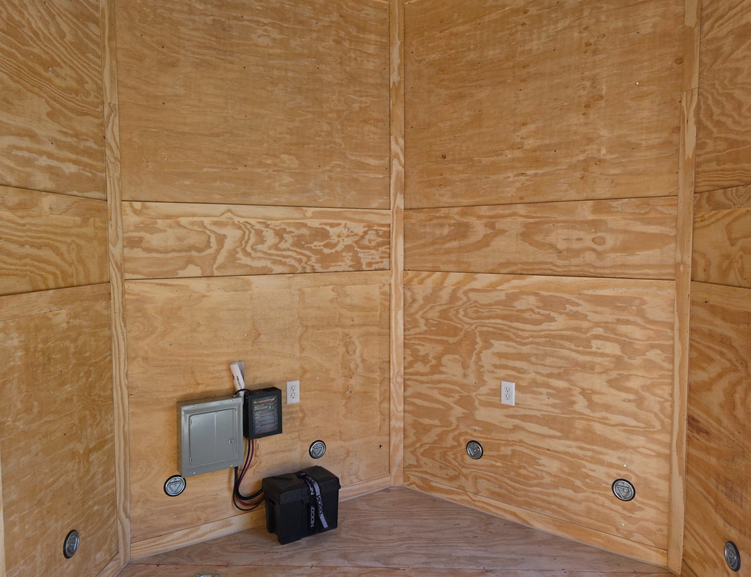 8.5x30 Charcoal V-Nose Hybrid 9.5 Interior (2) 7000LB Axles Front of Enclosed Inside 