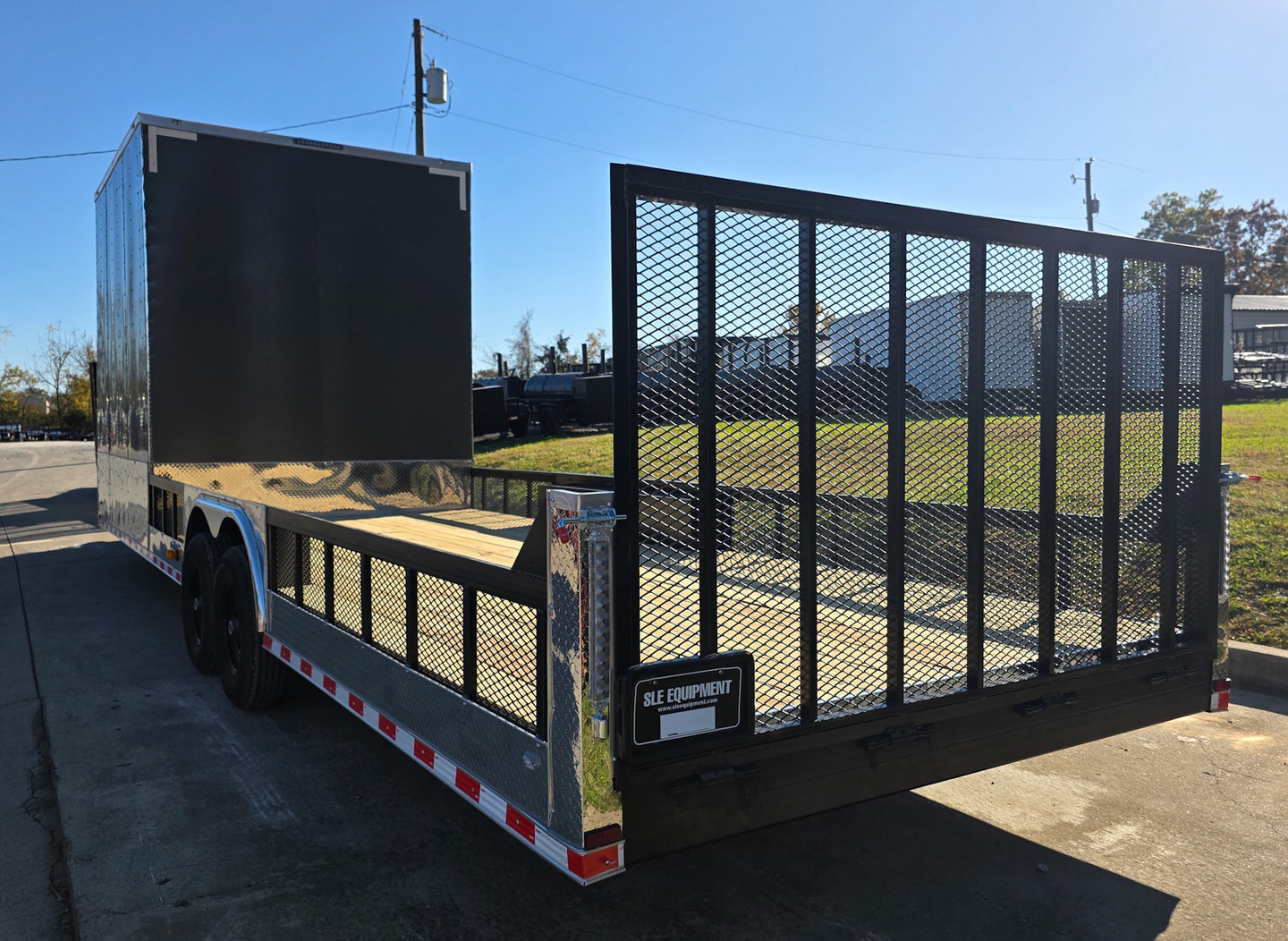 8.5x30 Charcoal V-Nose Hybrid 9.5 Interior (2) 7000LB Axles Left Rear Gate Up